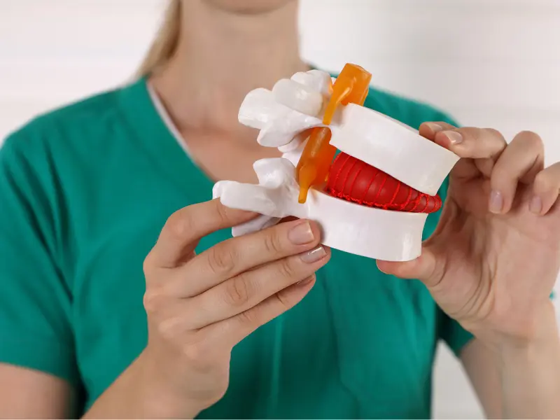 Disc Injury Treatment Near Me in Brookfield, WI. Chiropractic Consultation for Herniated Disc Pain Relief.